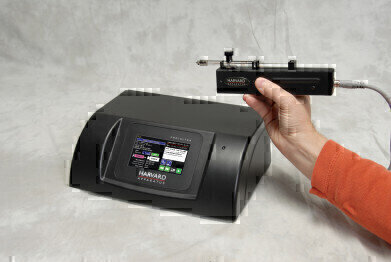 Delivery System for Hand-Held or Stereotaxic Mounting