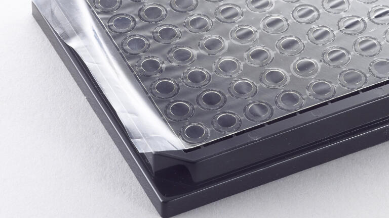 Gas Permeable Adhesive Seals for Live Cell Assays