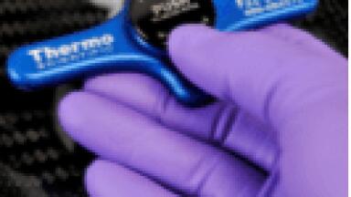 How does Thermo Scientific Auto-Lock rotor exchange facilitate rotor placement and improve safety, compared with traditional rotor tie-down systems?