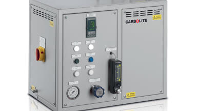 New System for Determining the CO2 Reactivity of Petroleum Coke in Accordance with ISO 12981-1