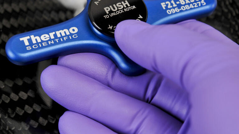 How does Thermo Scientific Auto-Lock rotor exchange facilitate rotor placement and improve safety?