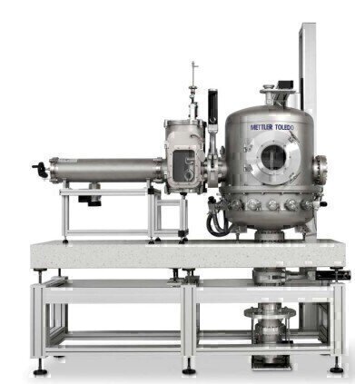 New Vacuum Mass Comparator to Support the Redefined Kilogram
